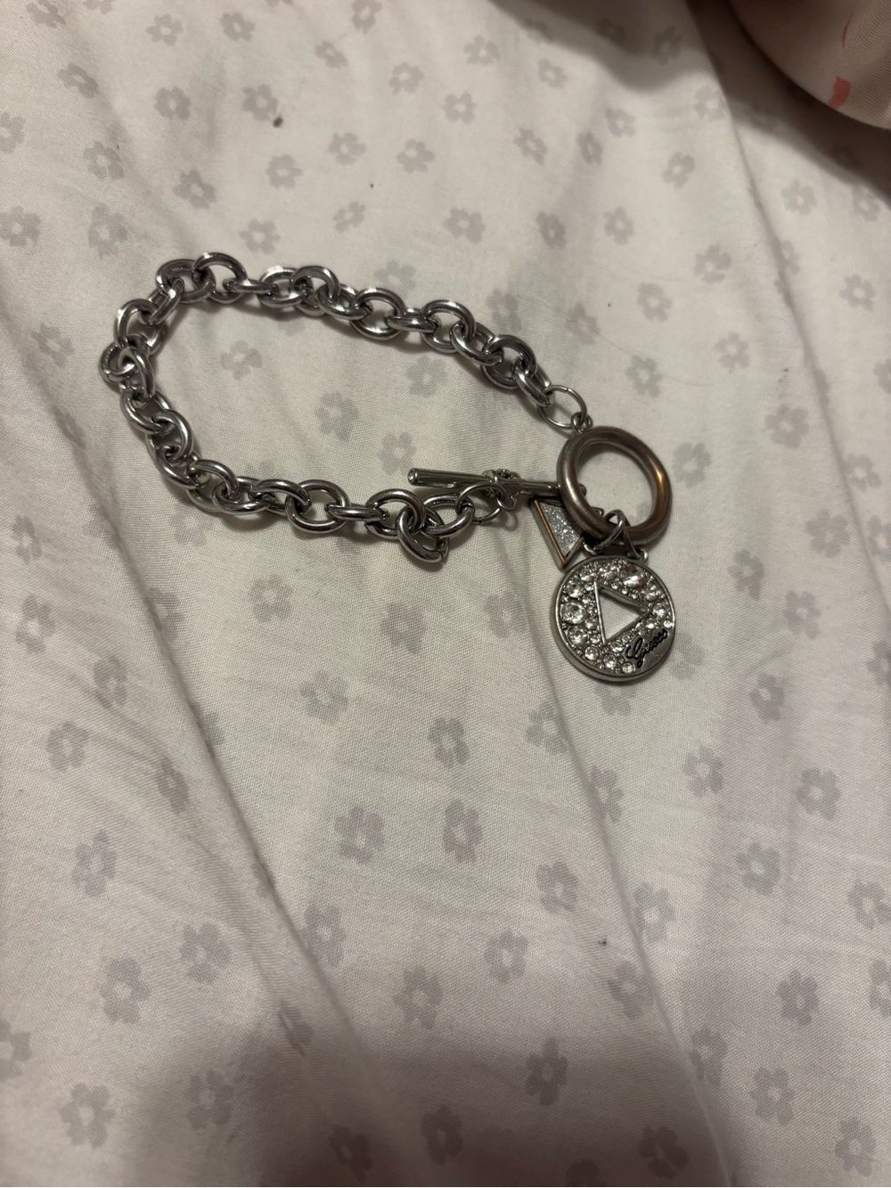 Guess Silver-Tone Crystal Logo Charm Bracelet